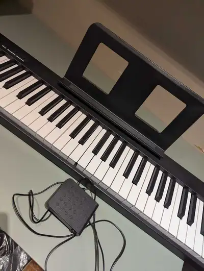 Folding Electric Piano, View more