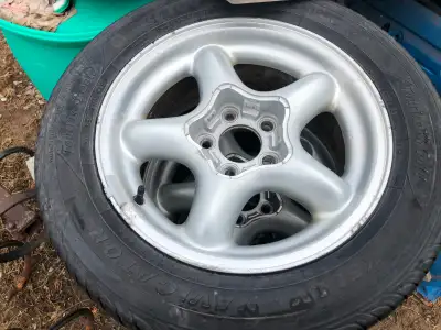 mustang rims with centers in good shape tirs are not the best but can remove them $150... kubota rim...
