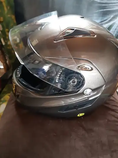 I bought this X small modular helmet from a lady who bought it new and only used it a couple of time...