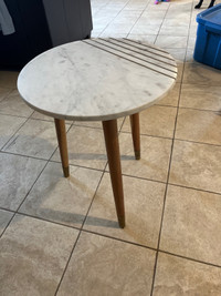 Stone top table with teak legs 