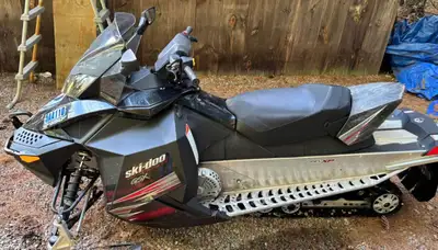 2021 jensen 5x10 enclosed trailer, 2008 ski doo gsx 550f package deal only. No holds, machine has 13...