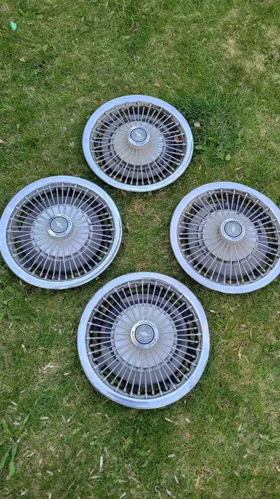 4 Chevy Caprice 14 inch spoke hubcaps need t.l.c., View more