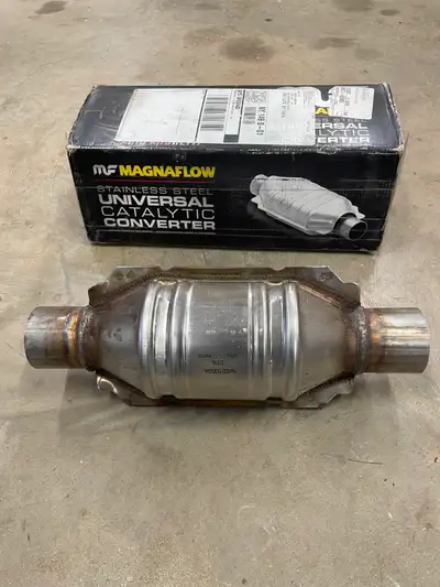 Universal Catalytic Converter, New in Box never installed.