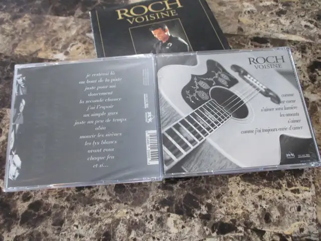 CD audio: Roch Voisine Special Edition - Chaque feu... (2 CD)63234779270785123