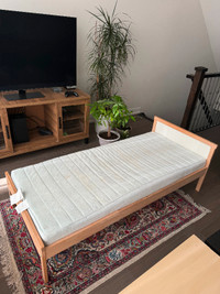 Solid wood Bed with mattress (like new and washable)