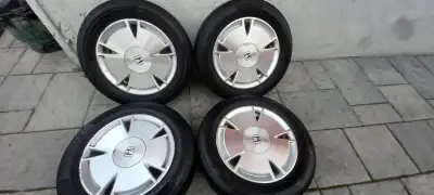 Set complet de mags origine Honda Fit/ Civic de 15" 4X100 avec pneus Été continental 185 65R15 quasi...