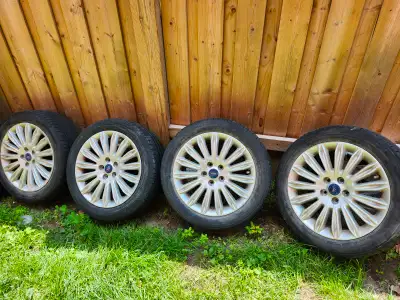 Four Ford Fusion 17" Rims - Alluminum, original factory OEM rims. Tires are NO good. Some scraches....
