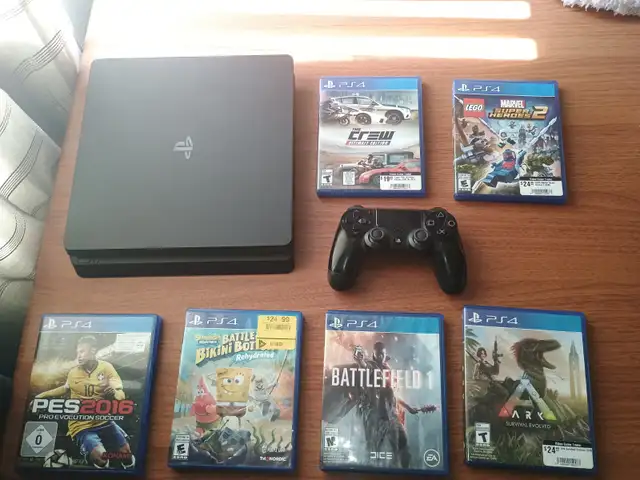 180 Cad.  PS4 In excellent condition Includes games. 180 Cad