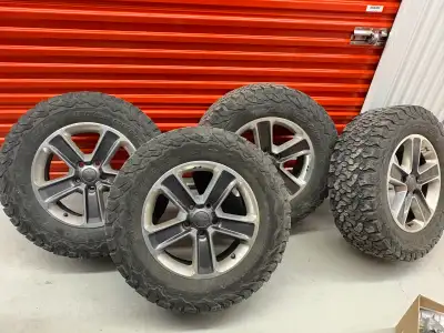 18” Jeep Rims & Tires 275/65R18 (Load E) w/ TPMS – $700 Selling a full set of 18” Jeep rims with tir...