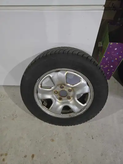 Snow tires for sale. 2 Good year tires and 1 Motomaster. All on rims. 215/60R/16 $125 for all 3.