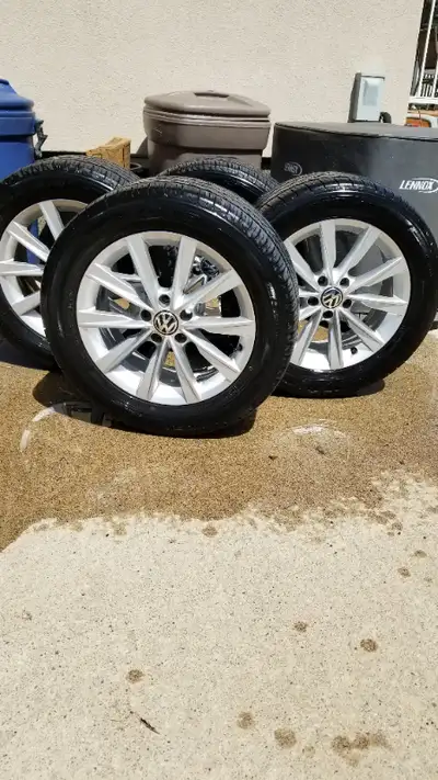 Tires are toyo extensa AT 2 and are new. Rims have never seen a winter, always taken off prior to sn...