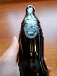 Coca-Cola Classic. Full glass bottles, unopened/factory sealed. 