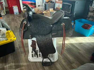 15” western rawhide trail saddle with 7” gullet really nice saddle does not fit any of my horses so...