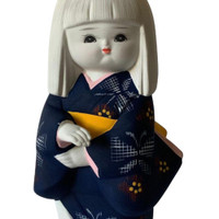 Vintage Ceramic Japanese Doll wearing a kimono