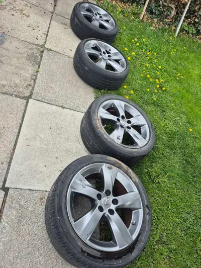 I am selling a set of four Lexus wheels with tires, sized at 225/40R18 and 255/40/15 staggered. Thes...