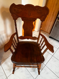 Antique wooden farmhouse rocking chair.