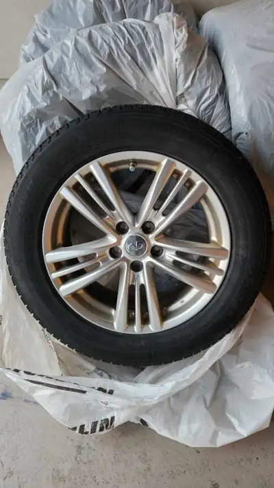 Set of 4, Clean OEM rims on Michelin Xice winter tires barely used. Garage stored. 235 55 17 Quick s...