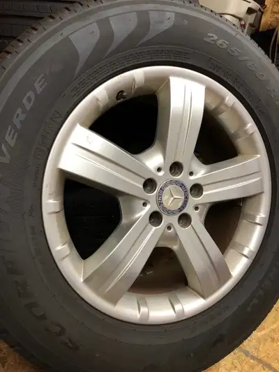 Original 18 inch Mercedes Rims with good all season Pirelli tires on them. Balanced and ready to go....