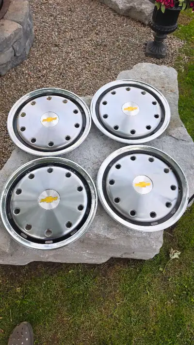 CHEVY TRUCK HUB CAPS LIKE NEW CONDITION SEE PICS FOR SIZING SHOULD FIT SEVERAL YEARS OF SILVERADO AN...