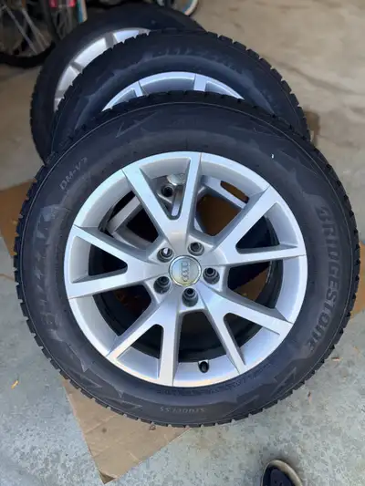 4 very lightly used Bridgestone Blizzak winter tires on 18” Audi OEM rims. Wheels have some scuff ma...