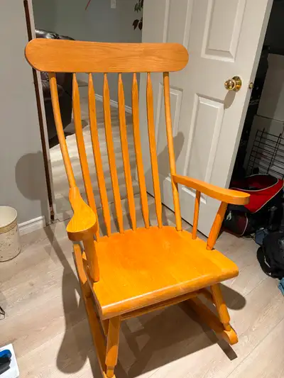 Solid wooden rocking chair, rarely used. Was made for us by a carpenter from the Mennonite Community...
