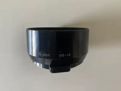 Nikon HS-10 Metal snap on lens hood for 85mm f/2 and 105mm f/2.5, View more