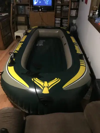 I am selling a used Seahawk 4, which is a four-person inflatable boat that is perfect for a leisurel...