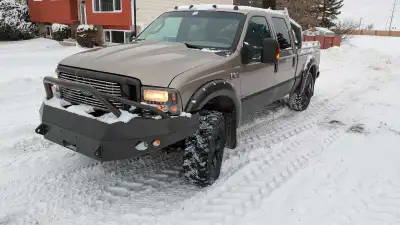 Late model 2003 F350 4x4 auto hubs, Lariate Leather ATC, PW, PDL, 6.0L Diesel ERG ECM flash, 4" lift...
