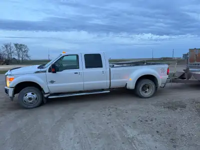 2012 F450 lariat 131,000 KM Great shape Deleted 5 inch straight pipe 379 litre slip tank plumbed int...