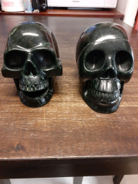 Large pair of carved crystal skulls