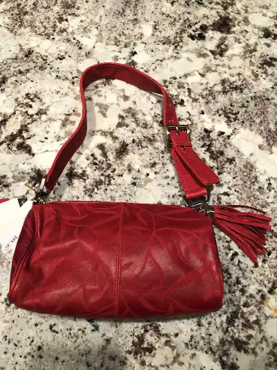 Red Leather Purse by Santi from Italy. Never used. Tags still on. Paid $85 plus tax. Asking $40. 8”...