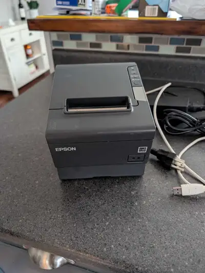 This is an Epson TM-T88V thermal receipt printer. It is a used item that is in good condition. Addit...
