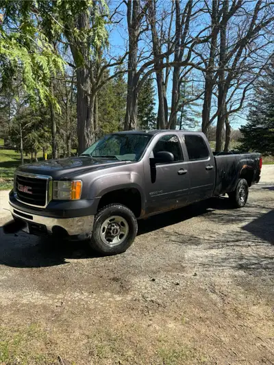 2010 gmc sierra 2500 HD. Needs exhaust manifold gasket which I have. Needs a box. Runs and drives we...