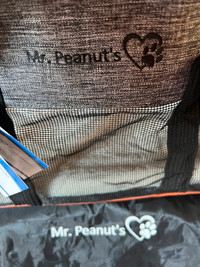 Mr Peanuts  pet carrier.  Grey and black for small animals