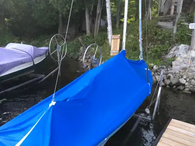 Well loved sailboat. Always stored inside during the winter. Comes with cover (as shown) for outdoor...
