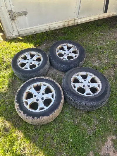 I'm selling a set of Hyundai Tucson 16-inch alloy rims, which come with two tires in decent conditio...
