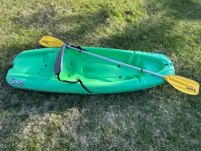 Pelican Solo kayak with matching paddle. Great kayak to sit-on for kids. Asking $100