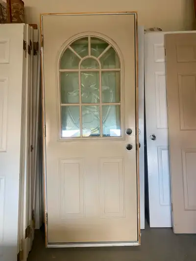 Exterior metal insulated door with frame and glass insert 33.5 “x81.5” (including frame measurements...