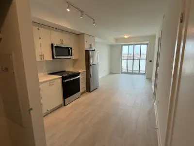 The condo has 2 bedrooms and 2 bathrooms. A modern open concept floorplan with laminate flooring. Th...