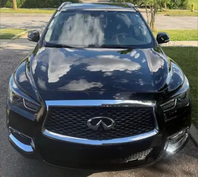 This sleek, black 2017 Infiniti QX60 is ready for your next adventure, offering both style and funct...