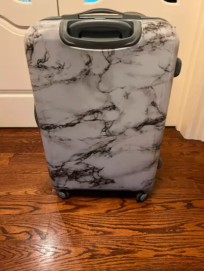 Heys company marble styled suitcase Dimensions of the suitcase: Height is 26 inch, the Width is 17 i...
