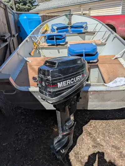 Comes with EasyLoader trailer, fuel tank, paddles, anchor
