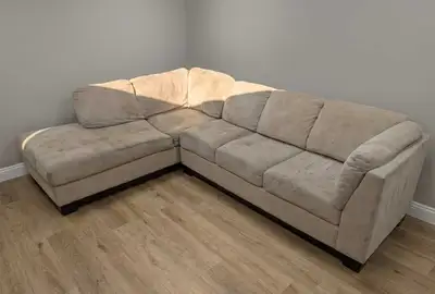 Sectional Couch for sale. It does need a good cleaning but most of the marks should come out. Pick u...