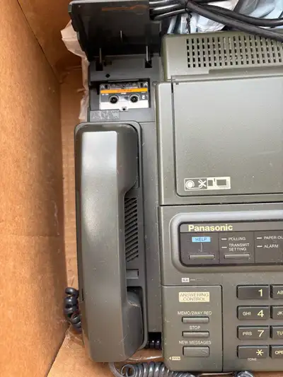 fax machine with micro cassette phone answering feature - as is, View more
