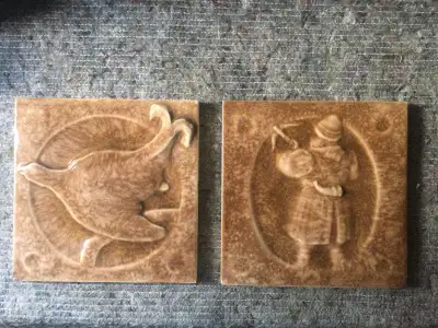 A very rare set of two tiles by North German Earthenware factory (N.S.T.G.), Grohn, circa 1895-1910...