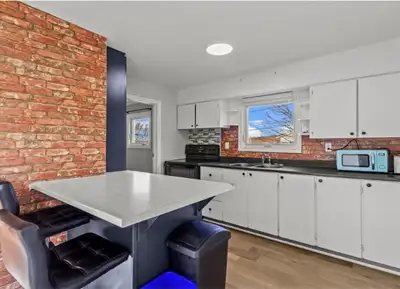 Bright top/main -level apartment featuring 2 bedrooms plus 1 office or nursery, private entrance, ow...