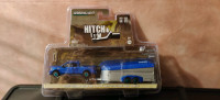 Greenlight Collectables Hitch and Tow 2018 Nissan Titan chase