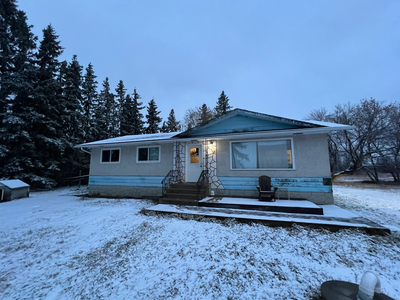 Private Acreage Living with Barn & Pasture in South East Sturgeon County Escape to this secluded, ch...