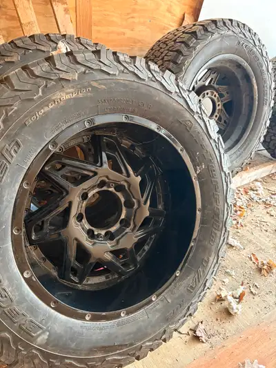 Selling four brand new 35/12.5/20 bfg all terrains on a nice set of 20x12 rims Tires are E rated 8x6...