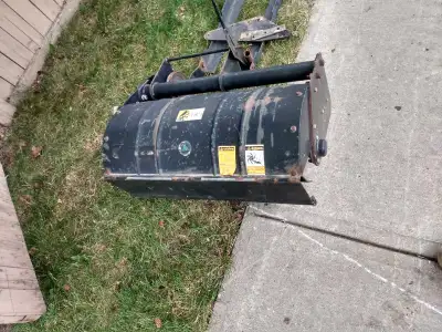 Uses your belt on tractor to spin rototiller. Or you could add a motor 600 obo